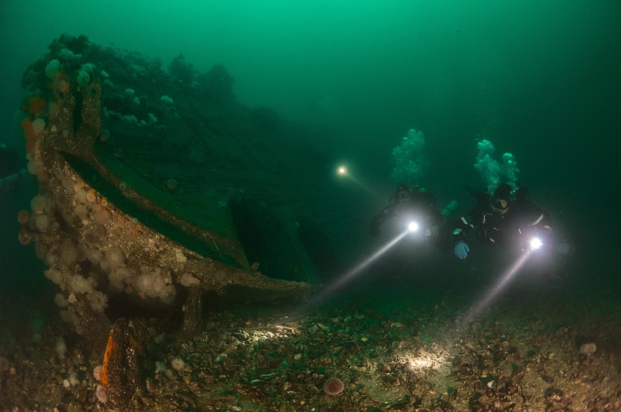 Divers exploring the SMS Karlsruhe in Scapa Flow