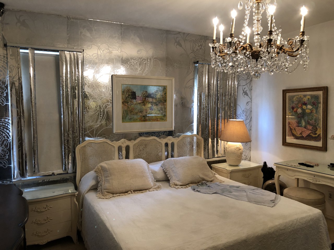 The other side of the room. On the bed, Lucille's nightdress